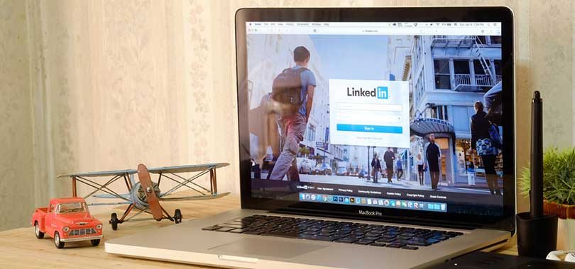 Laptop and linkedin page
