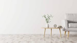 A white background with table and chair