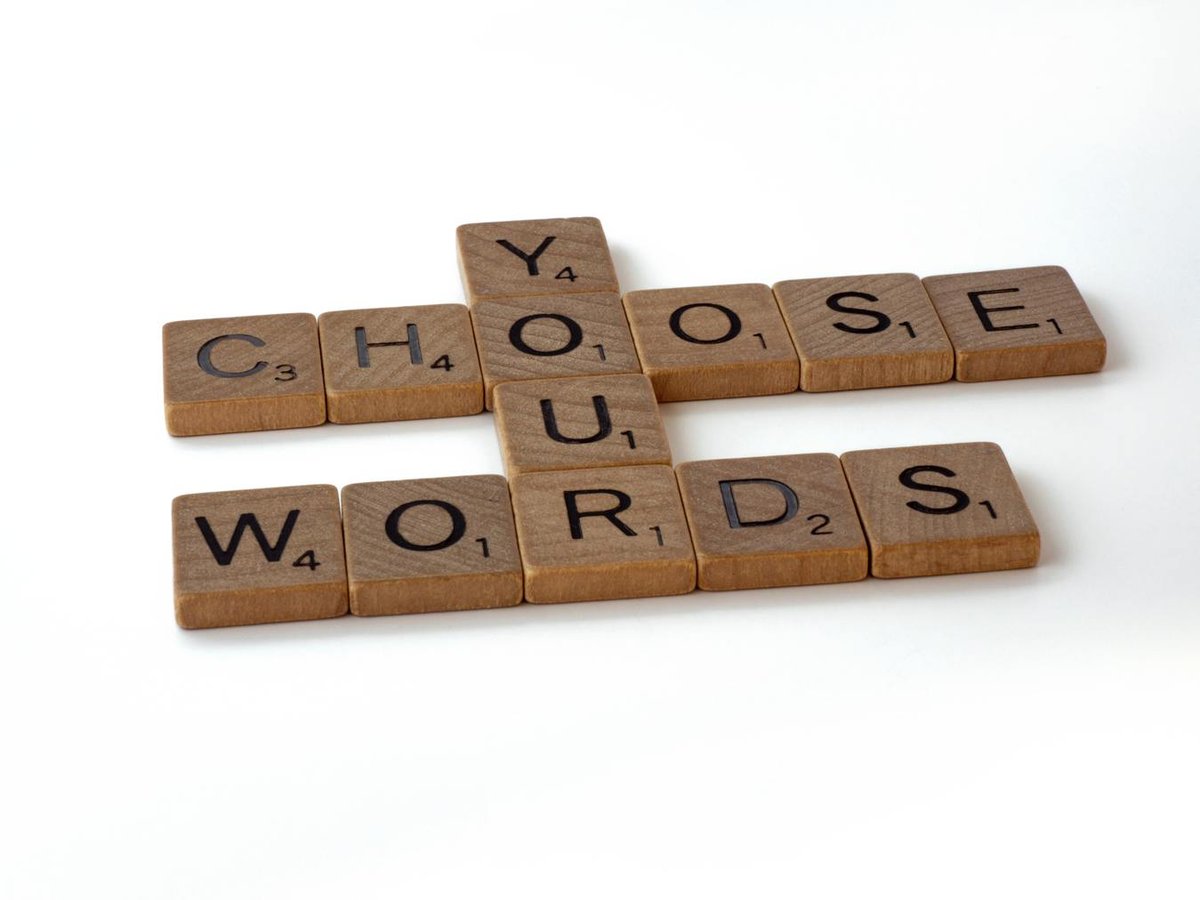 Choose your words on a structured scrabble board game pieces