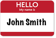 A nametag with the name "John Smith" on it