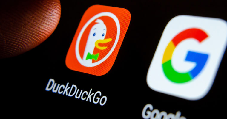 DuckDuckGo logo and Google logo in a phone
