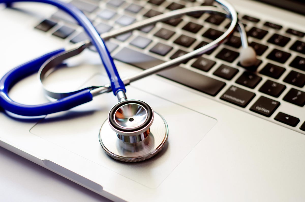 A stethoscope on a laptop