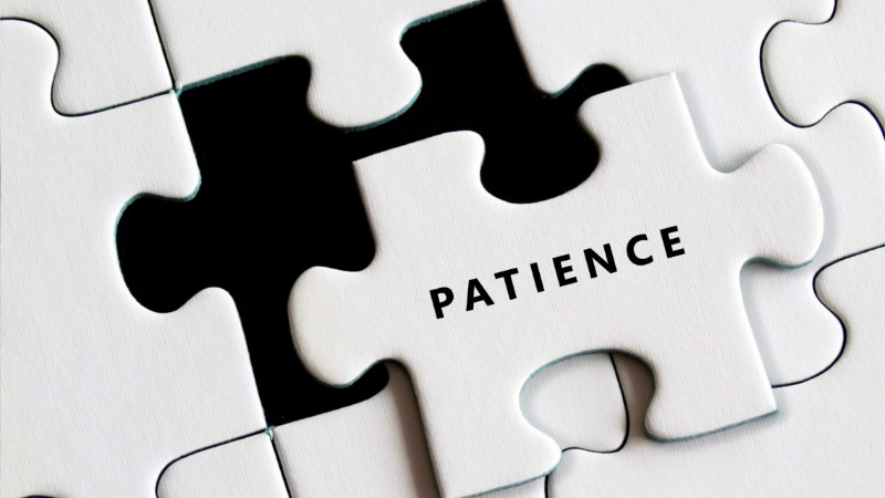 Patience on a white puzzle piece