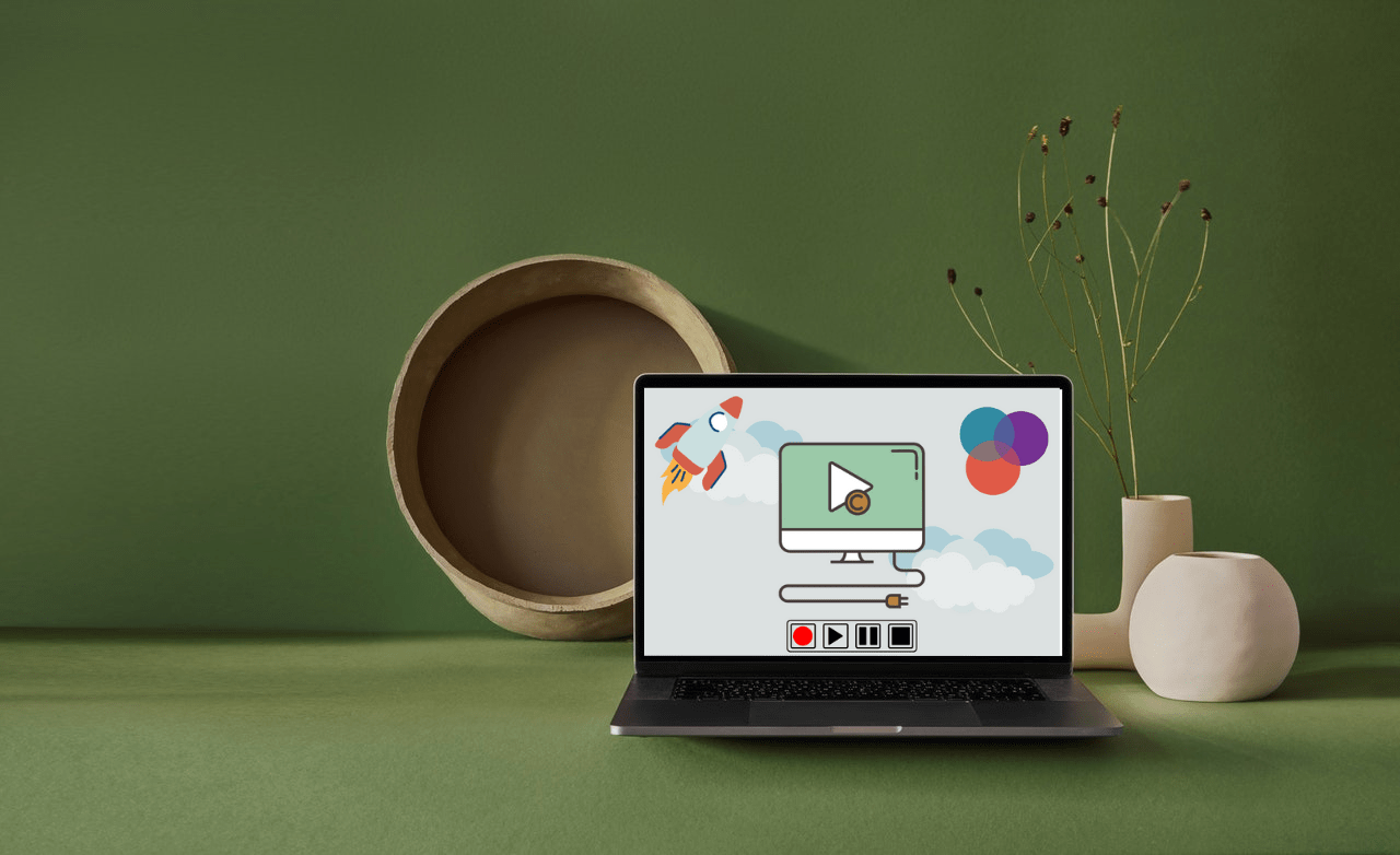 Infographic video on a laptop with vase and plant behind it