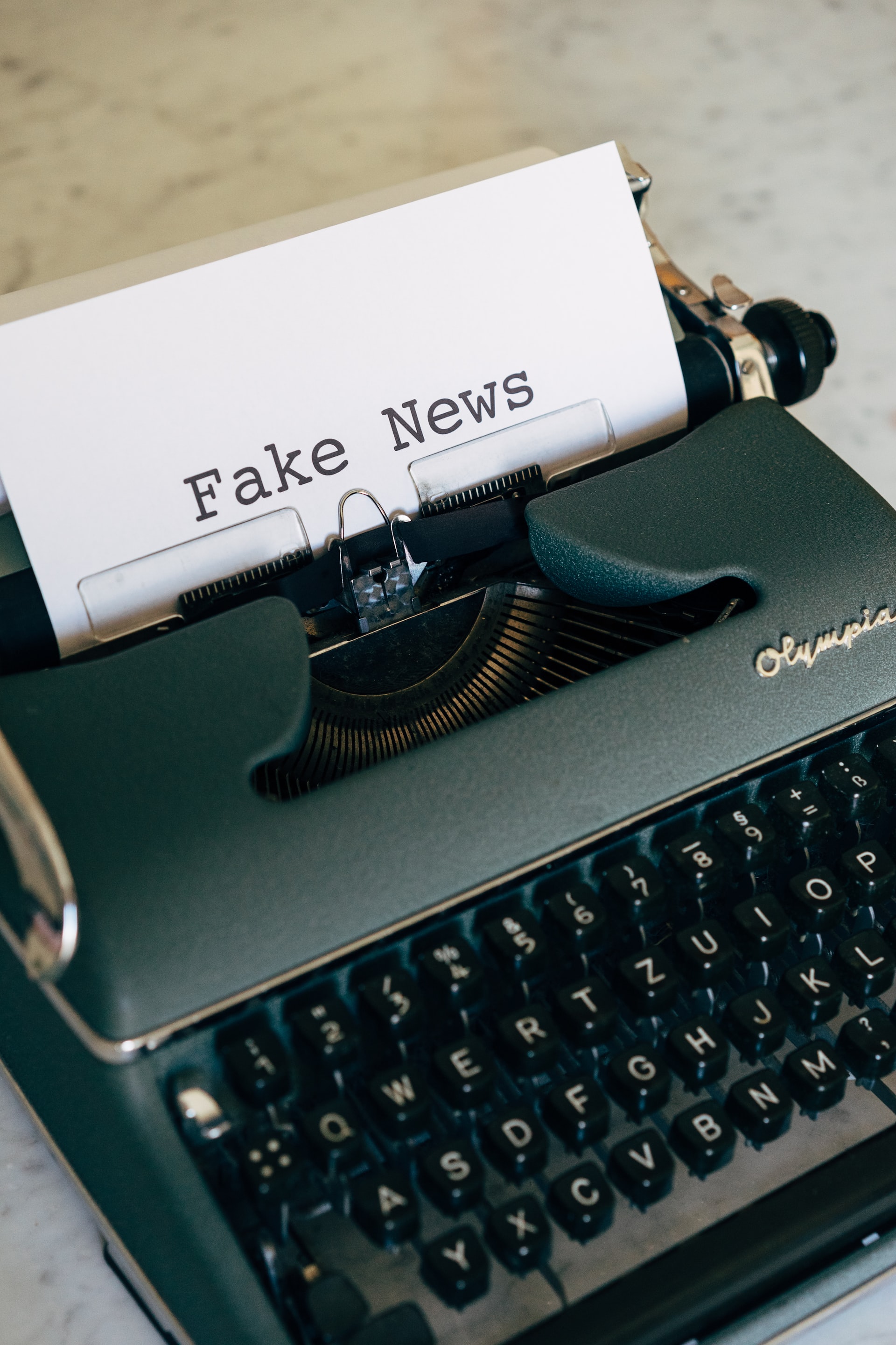 Writing machine with fake news written