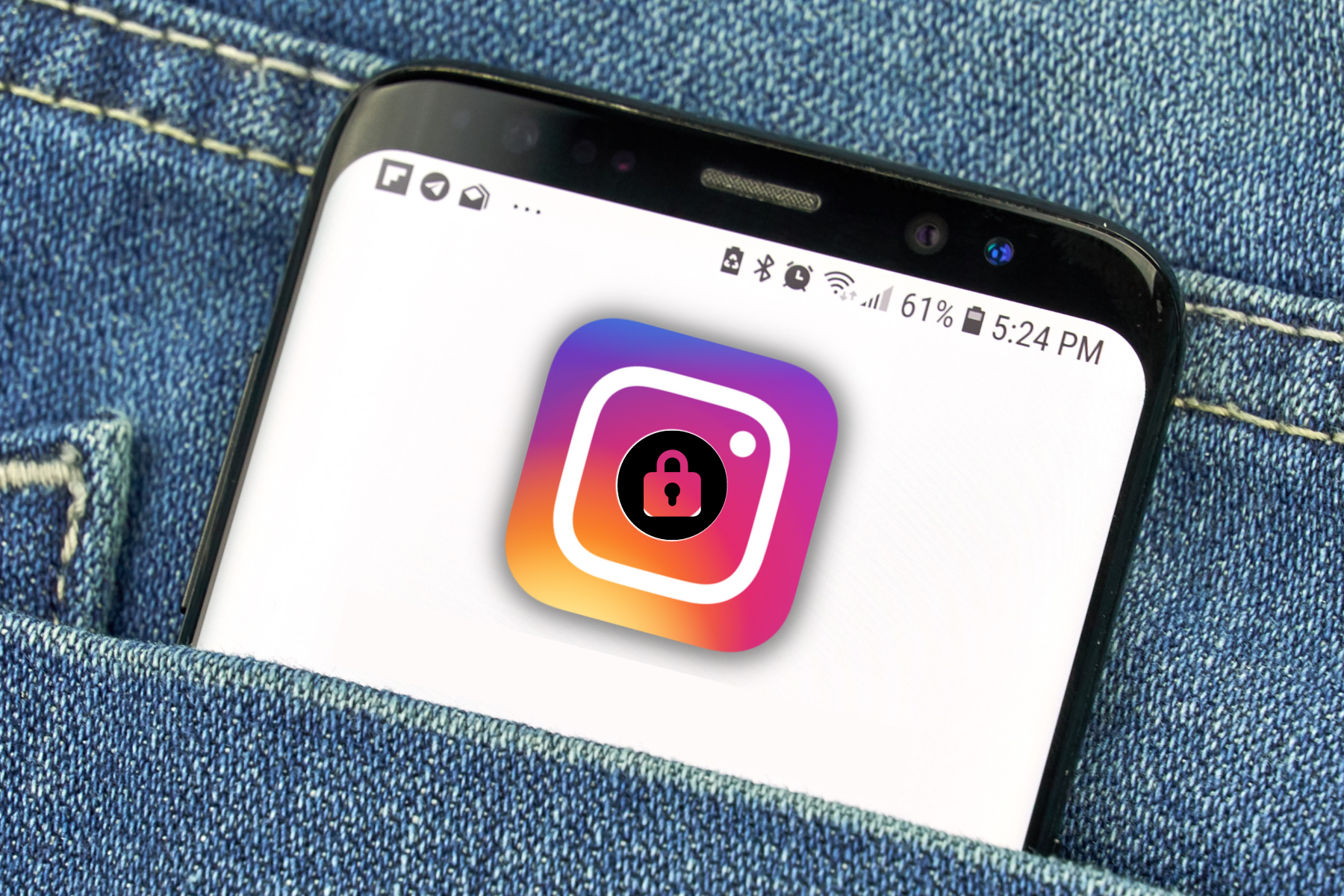 A smartphone in the pocket with the Instagram app logo and a lock in the center of the logo