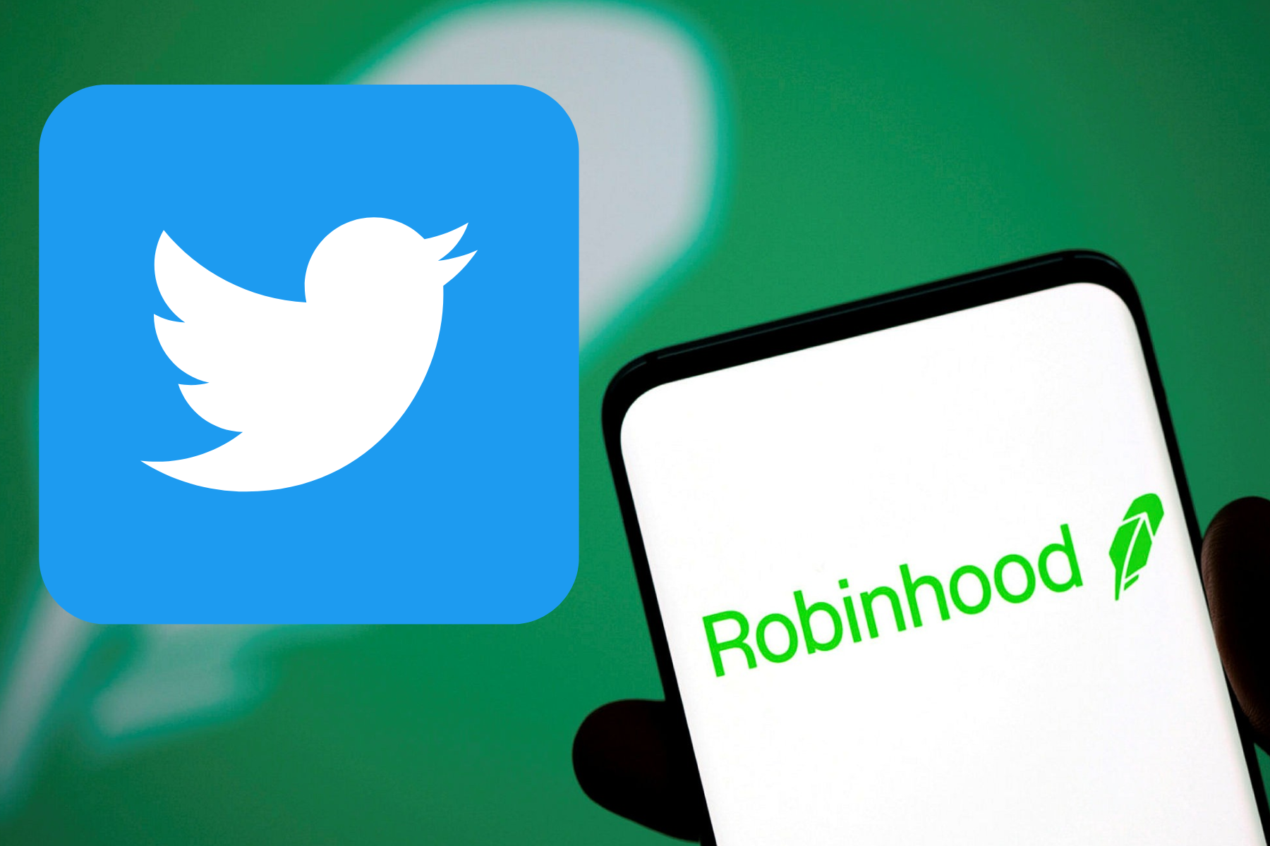 A mobile phone displaying Robinhood beside the Twitter logo