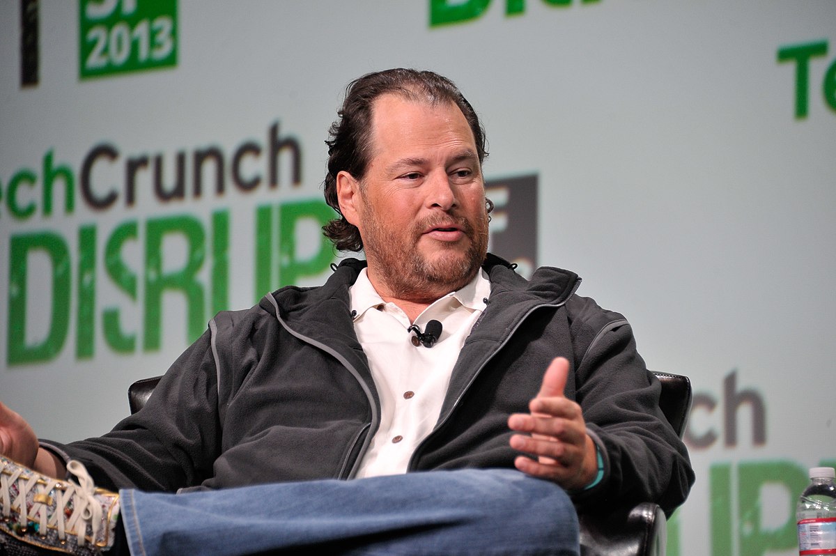 Marc Benioff wearing a black jacket while sitting and talking