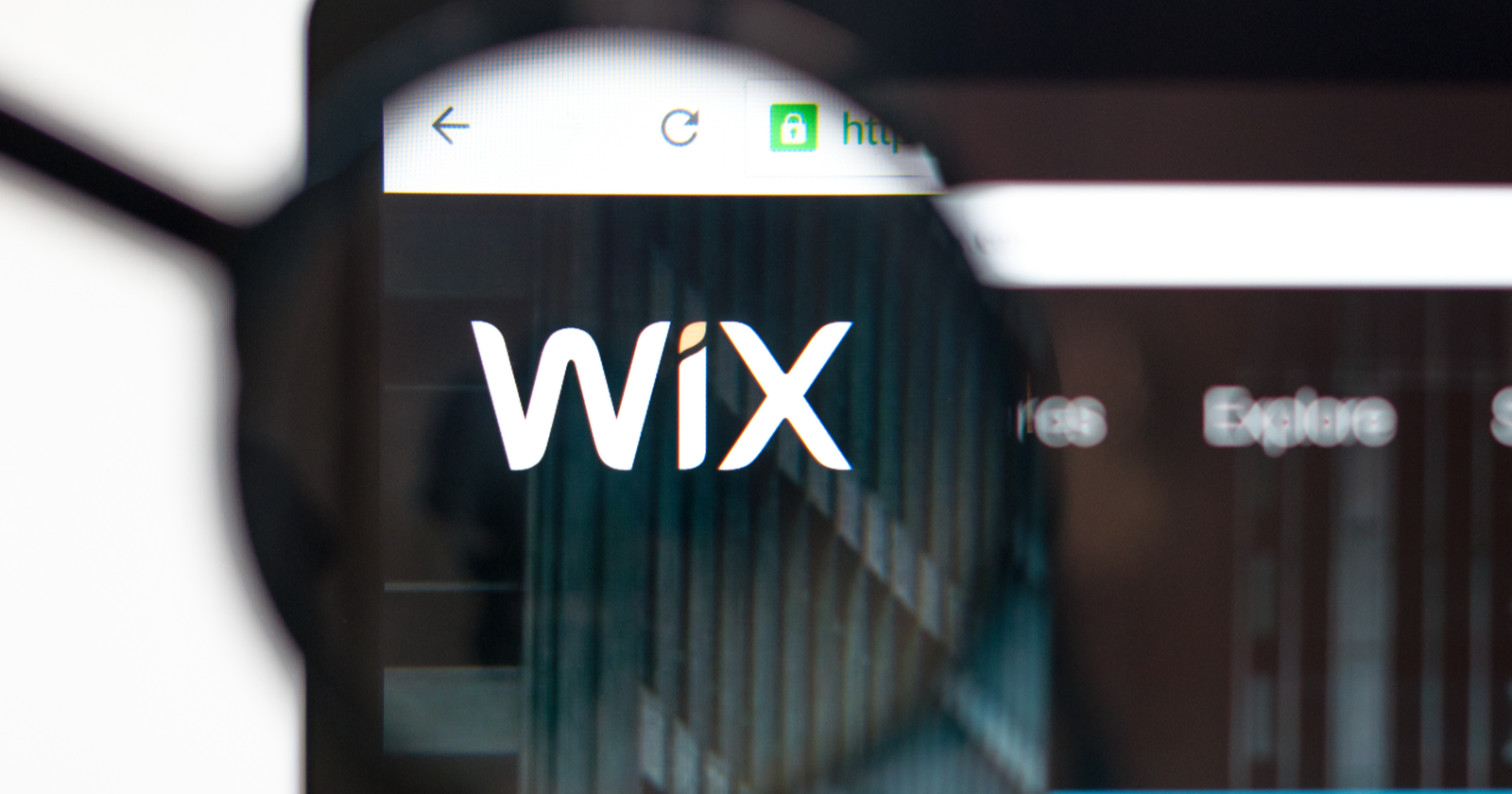 Wix logo in a magnifying glass