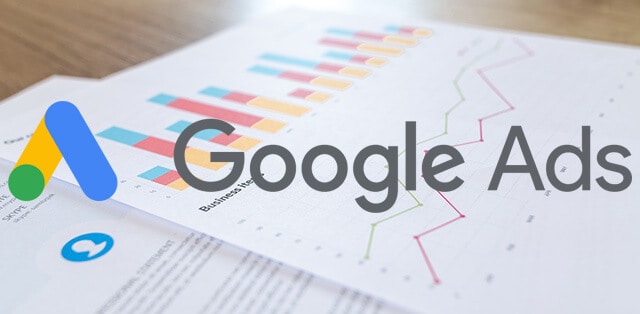 A graph paper with the Google Ads logo