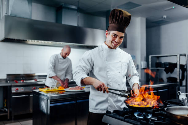 A chef doing flambe cooking