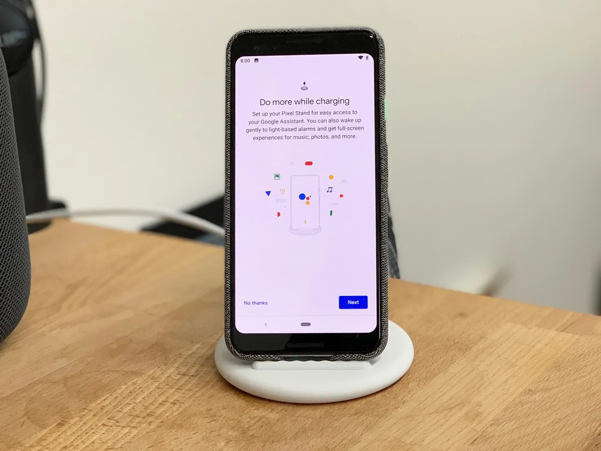 A Google Pixel phone charging using a wireless charger.