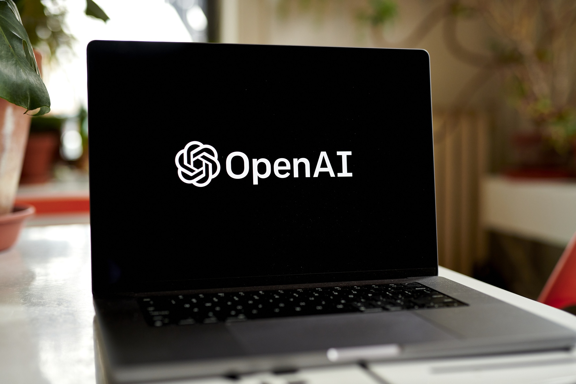 OpenAI logo on a laptop