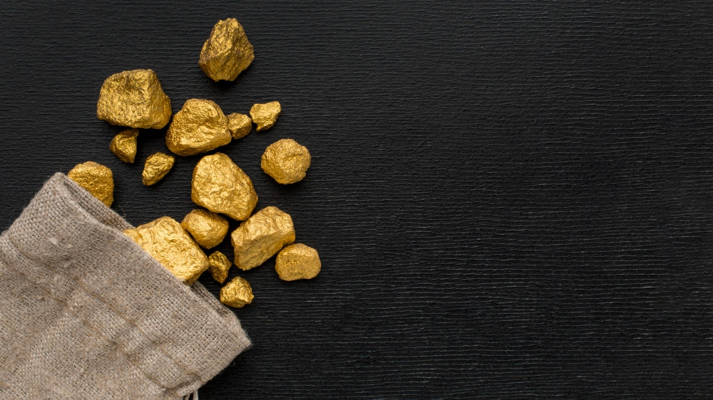 Gold ores out of a brown sack