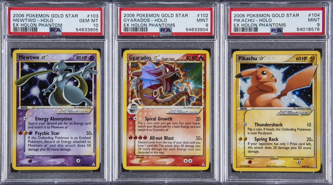 Three Pokémon cards