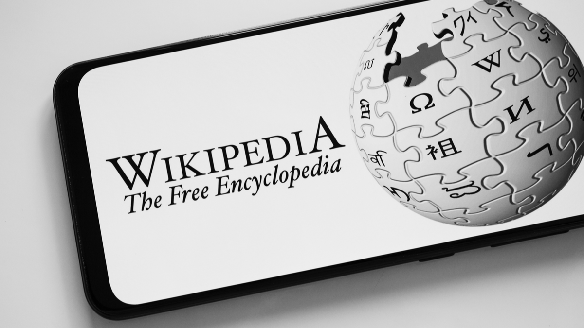The official Wikipedia logo on a phone
